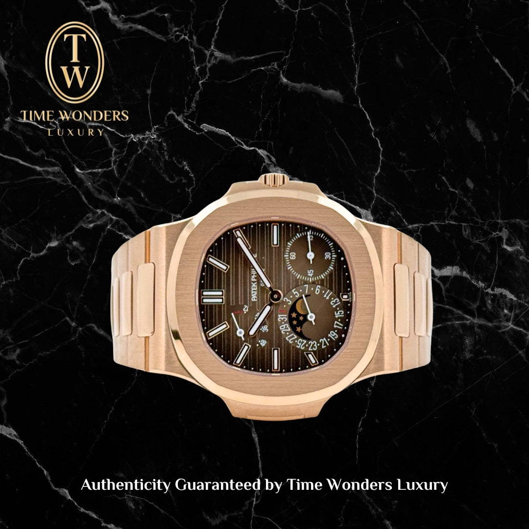 Mint Q2 2024 Patek Philippe Nautilus Moonphases 5712/1R Rose Gold Brown Dial Moon Phases 5712